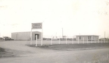 Early picture of business with original shop